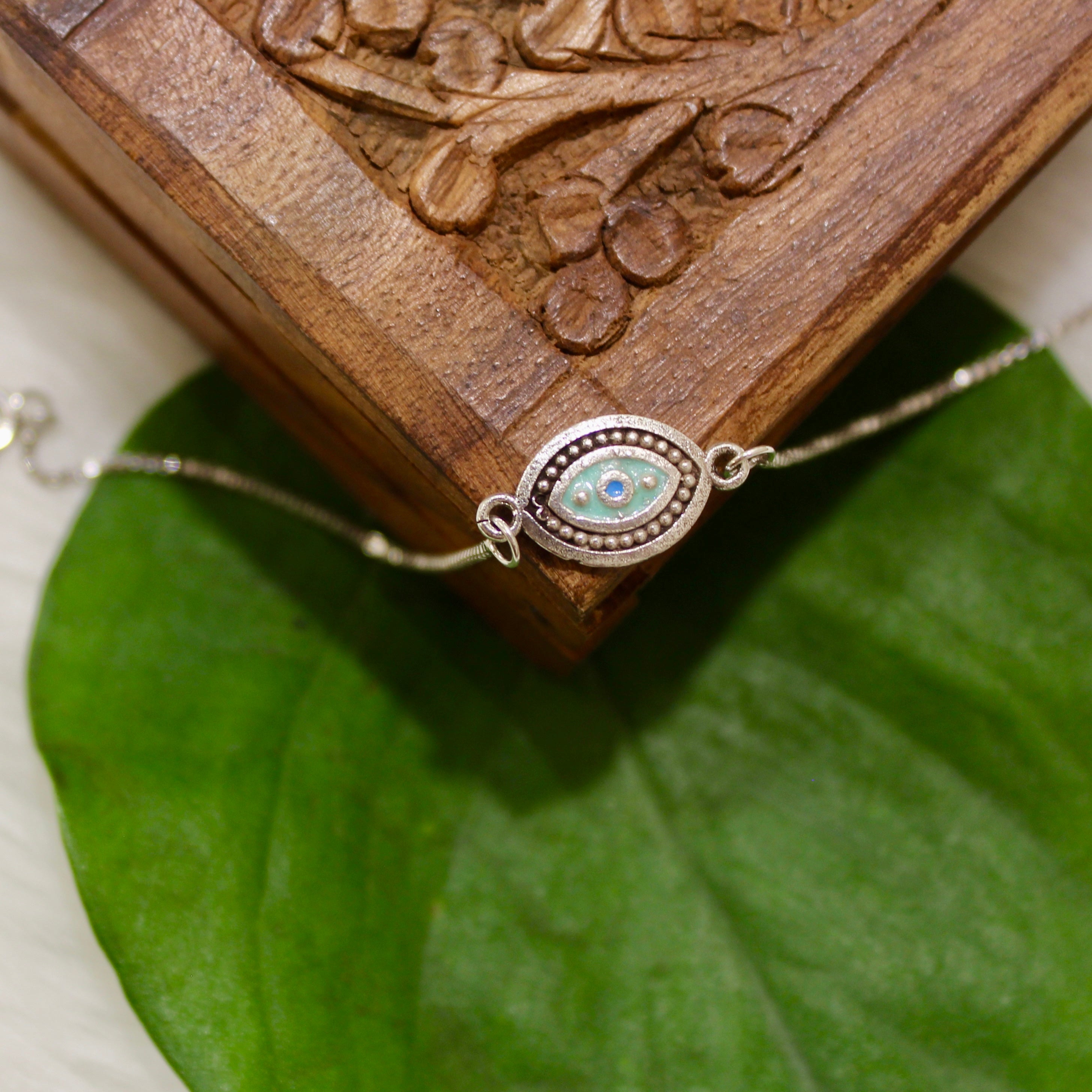 Aqua Evil Eye Chained Rakhi In 925 Silver