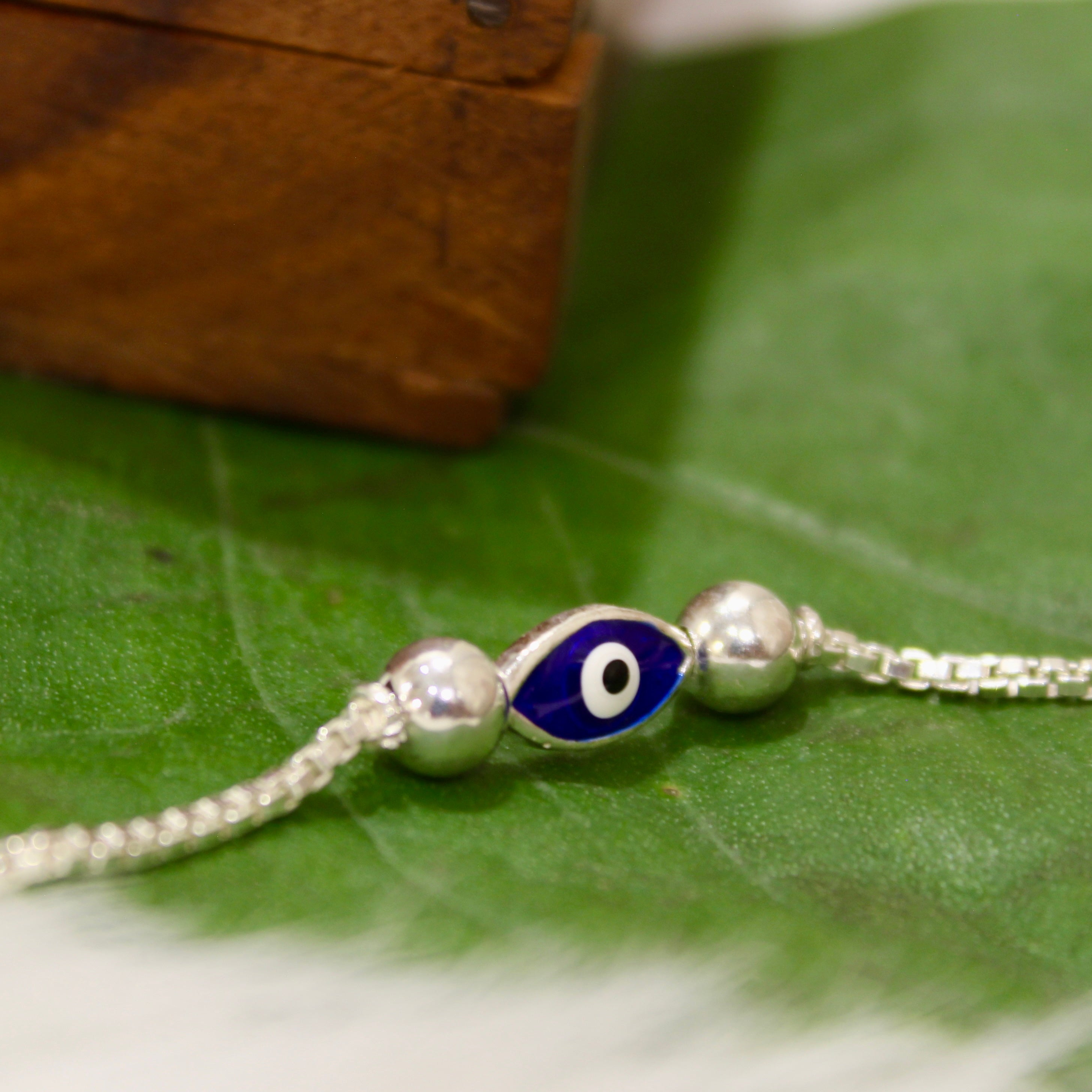 Evil Eye Charm Chained Kids' Rakhi In 925 Silver