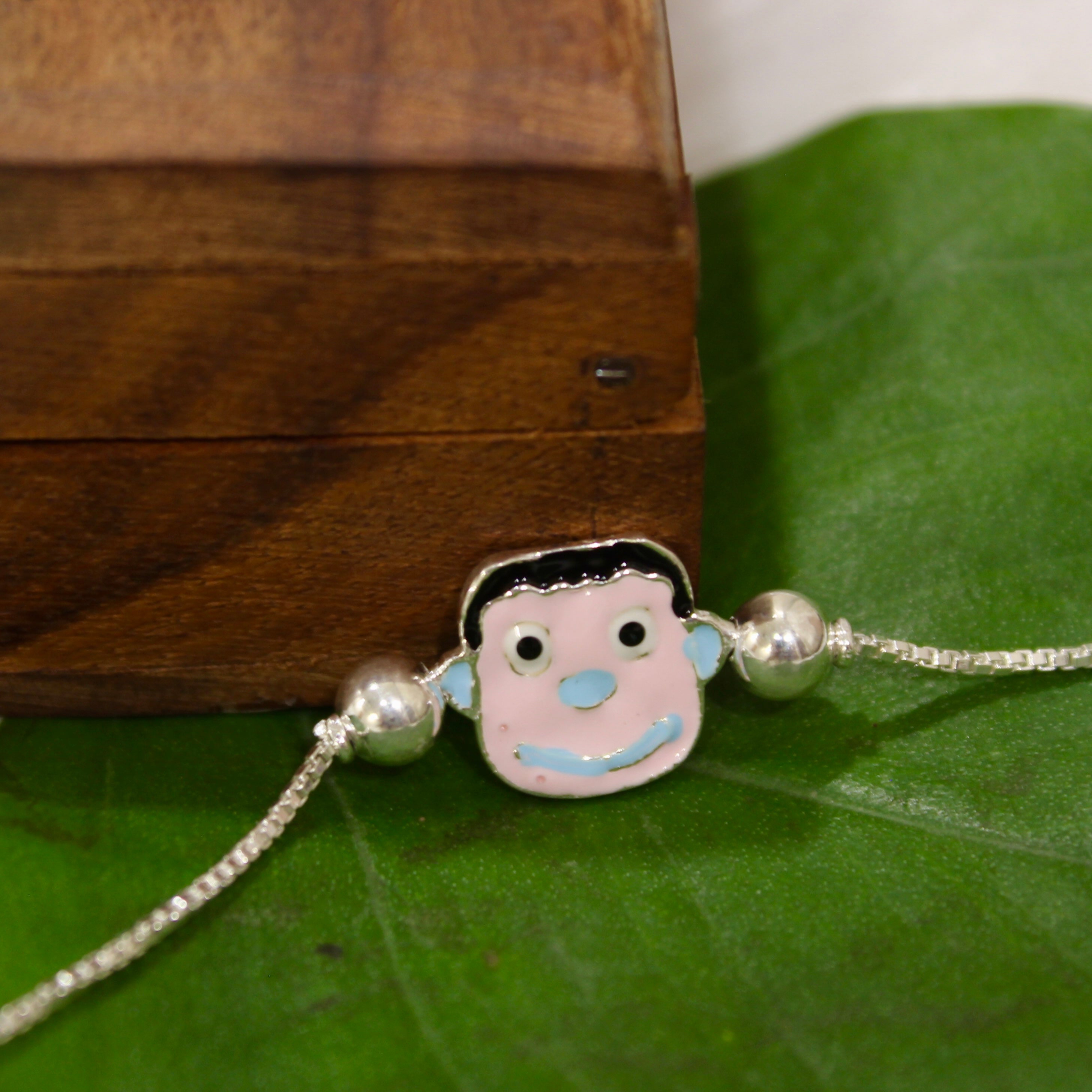 Peko-Chan Chained Kids Rakhi In 925 Silver