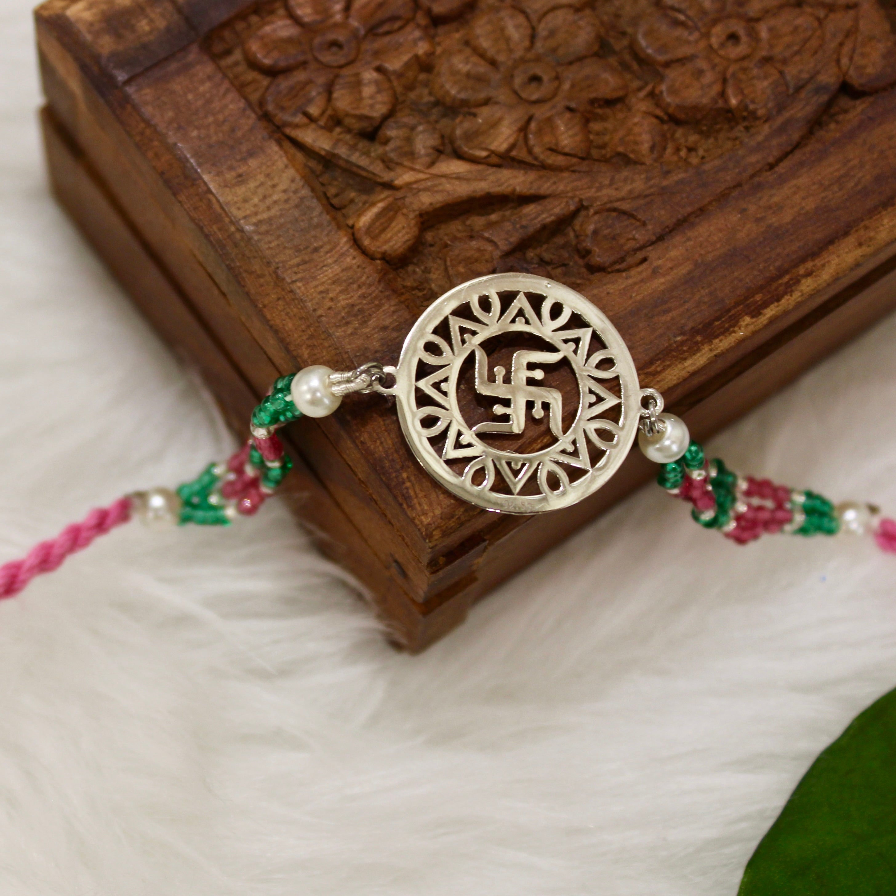Satiya In Circle Pink Thread Rakhi In 925 Silver