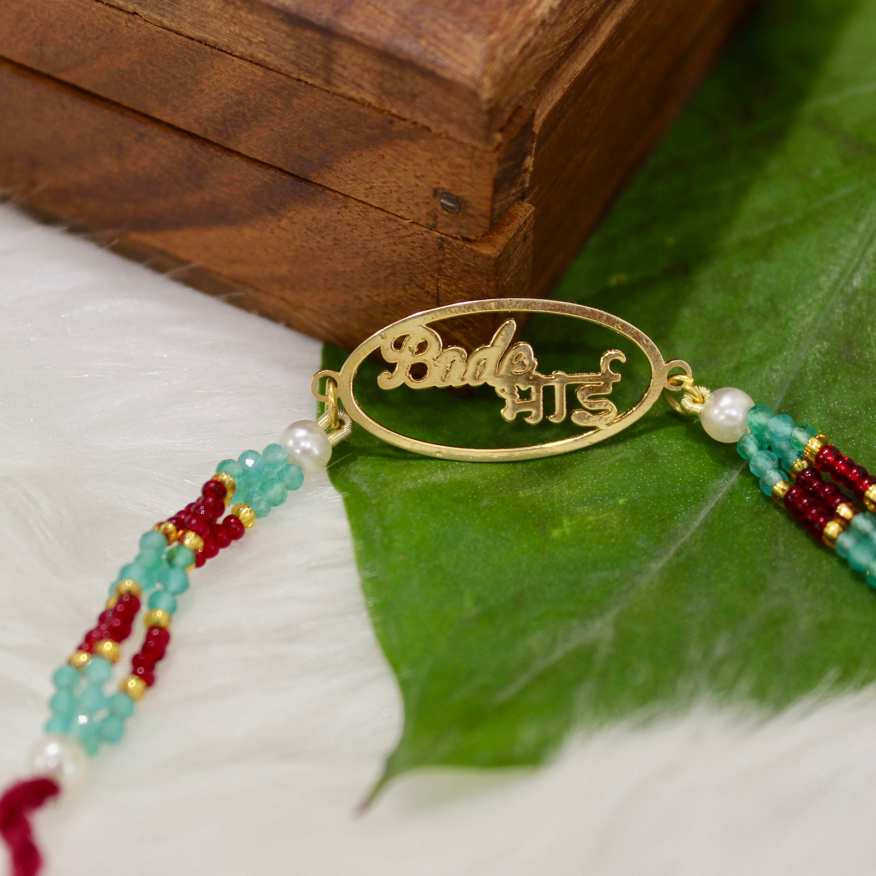 Bade Bhai In Circle Gold Polish Maroon Thread Rakhi In 925 Silver