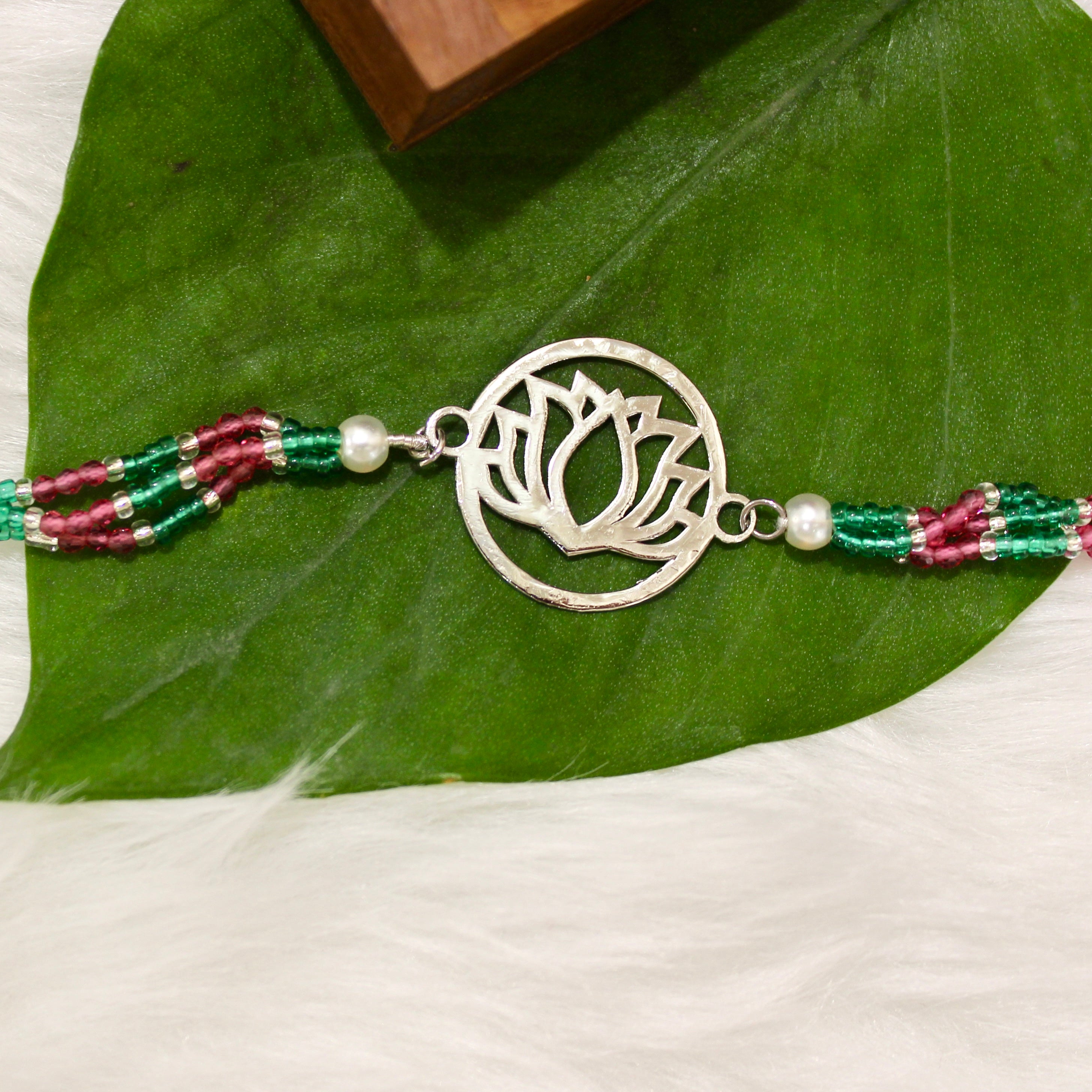 Lotus In Silver Polish Pink Thread Rakhi In 925 Silver