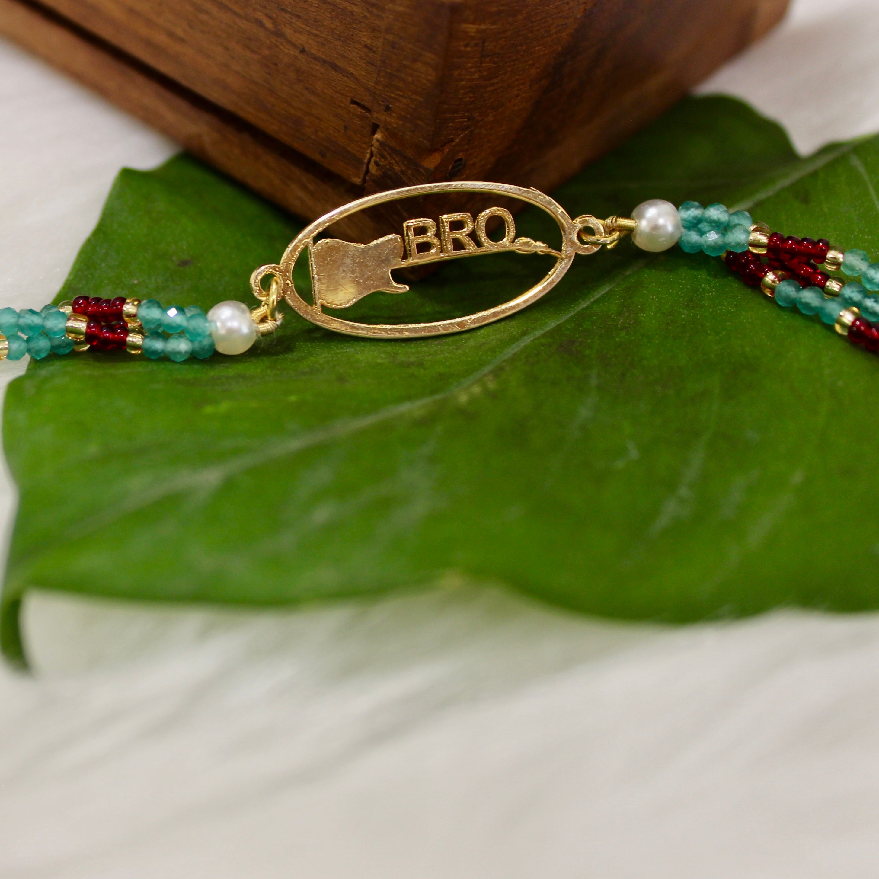 Bro With Guitar Maroon Thread Rakhi In 925 Silver