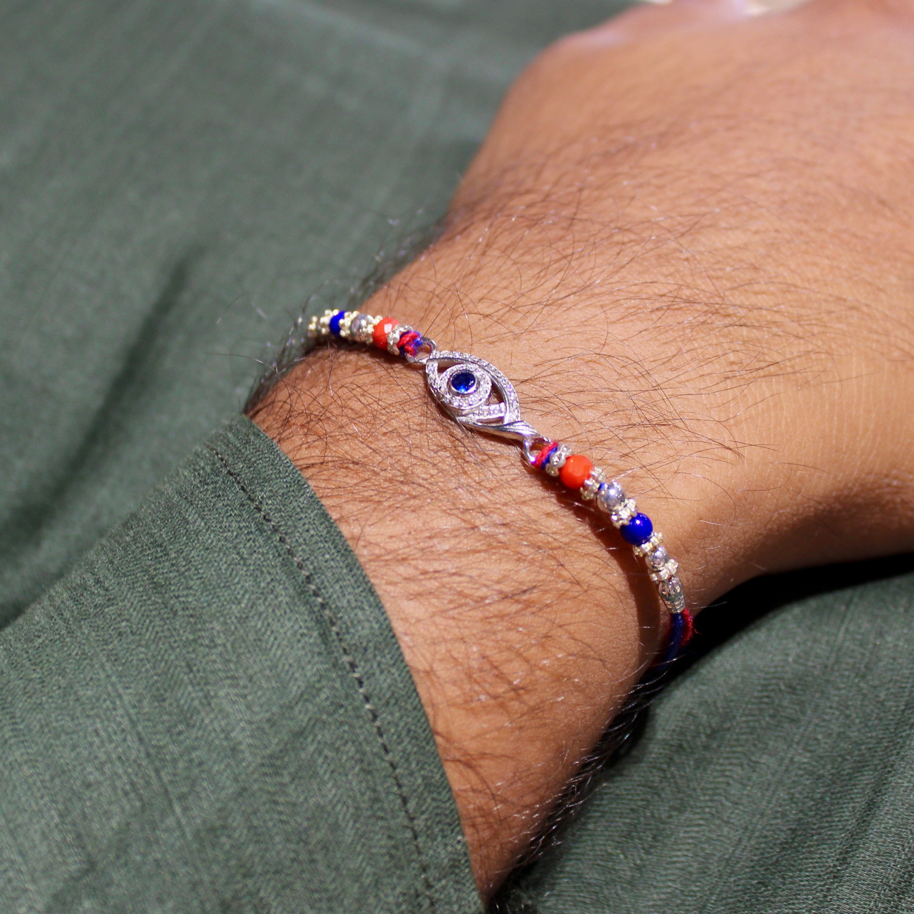 Evil Eye Charm Blue Thread Rakhi In 925 Silver
