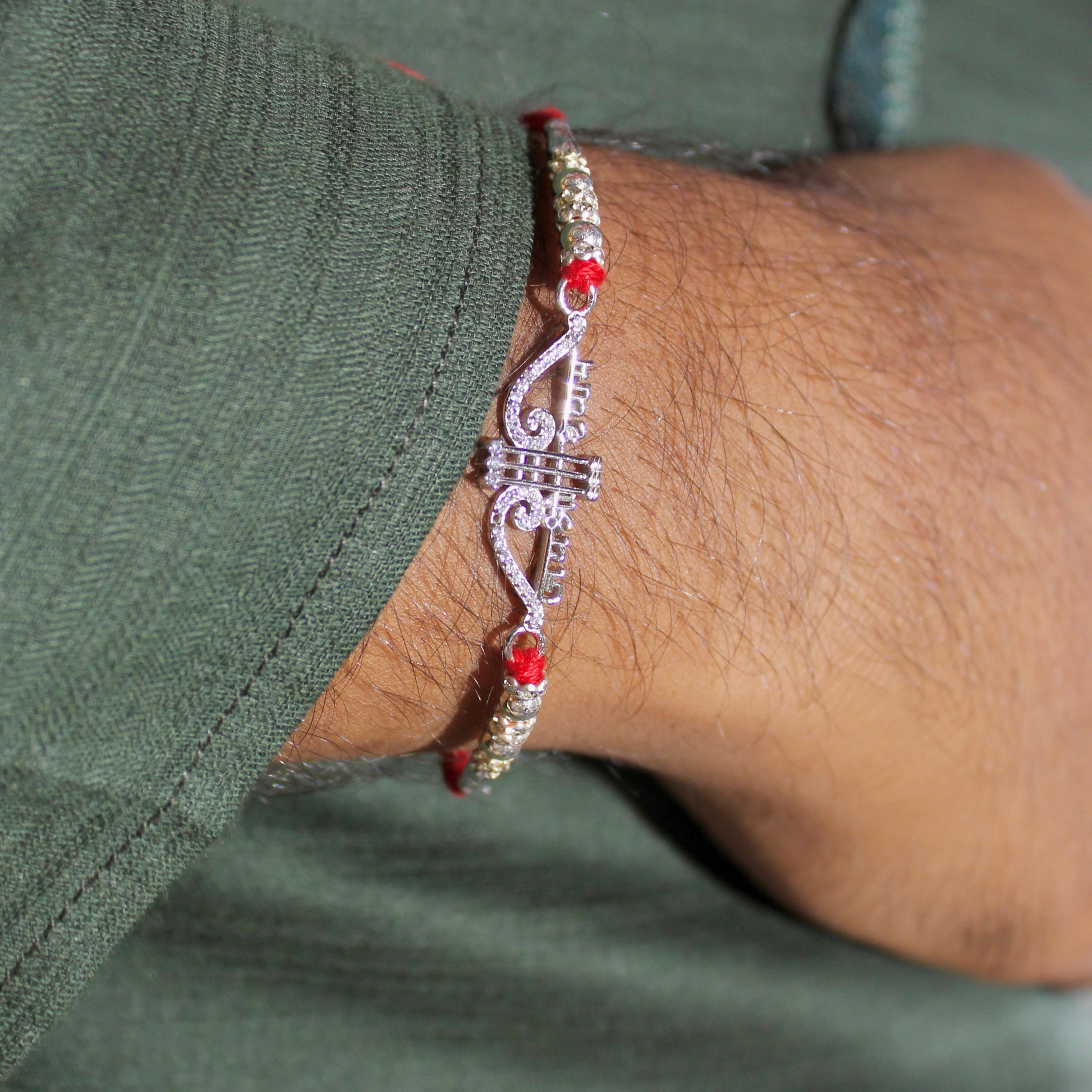 Jaishree Ram Charm Red Thread Rakhi in 925 Silver
