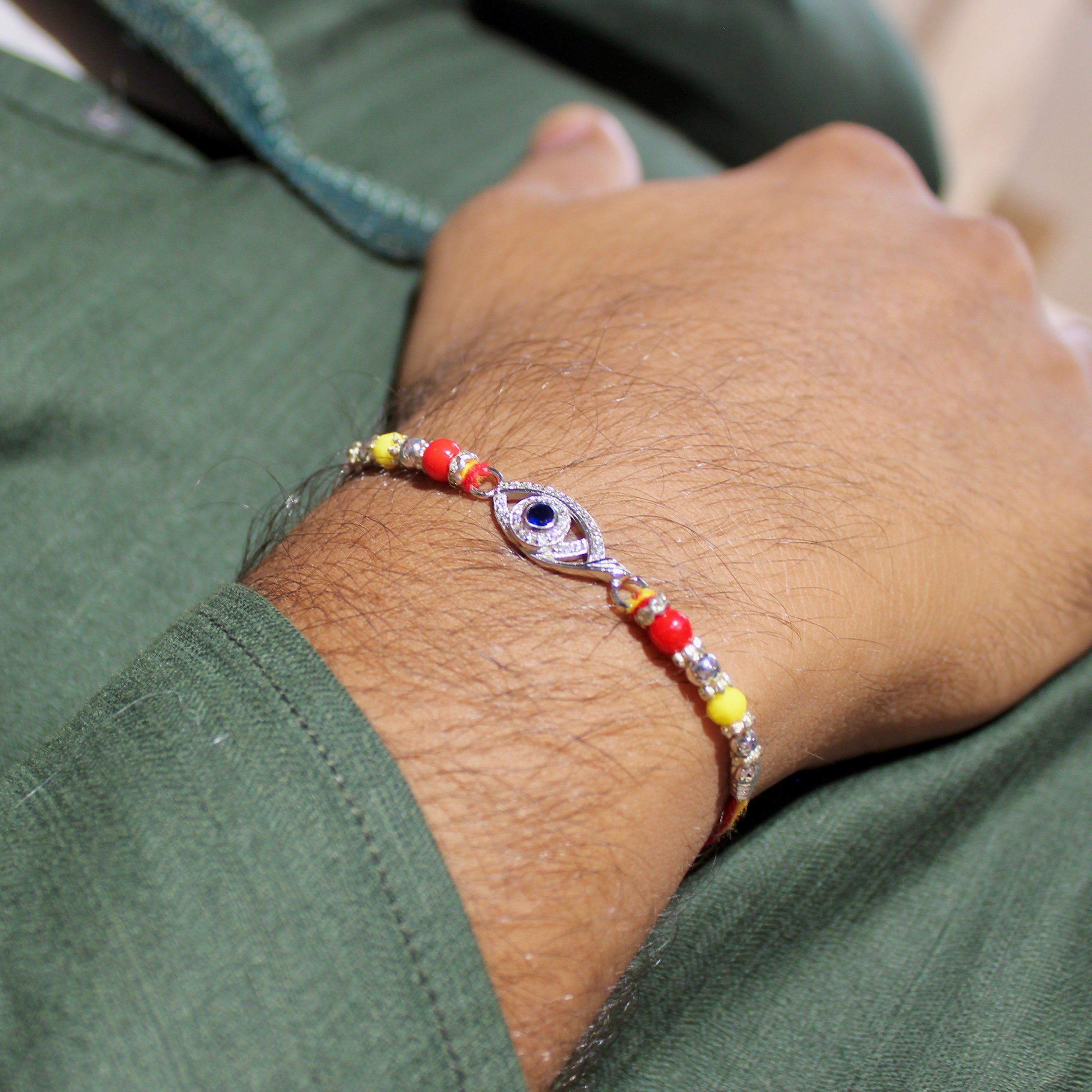 Evil Eye Charm Yellow Thread Rakhi In 925 Silver