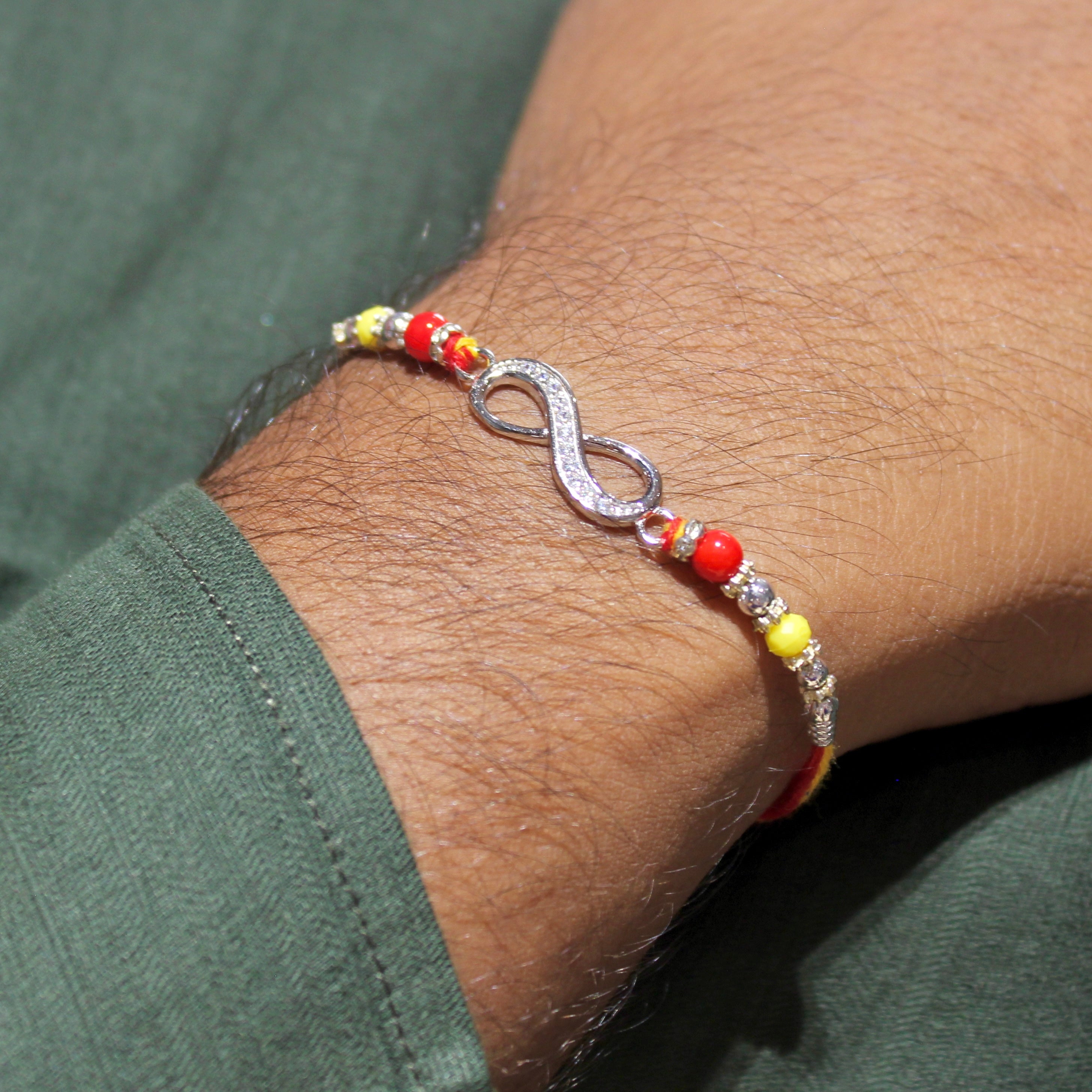 Infinity Silver Yellow Red Thread Rakhi In 925 Silver