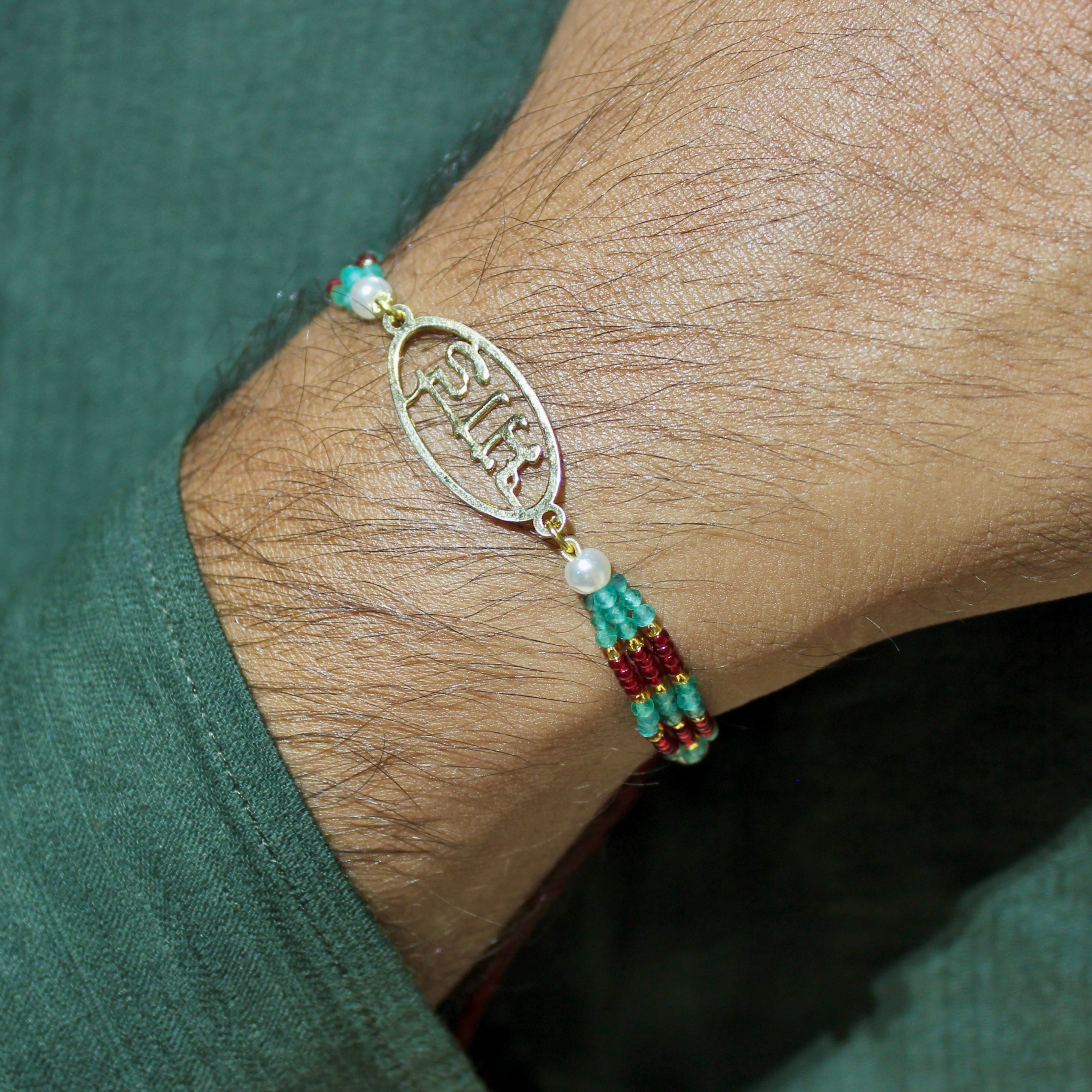 Bhai in Circle Gold Polish Maroon Thread Rakhi in 925 Silver