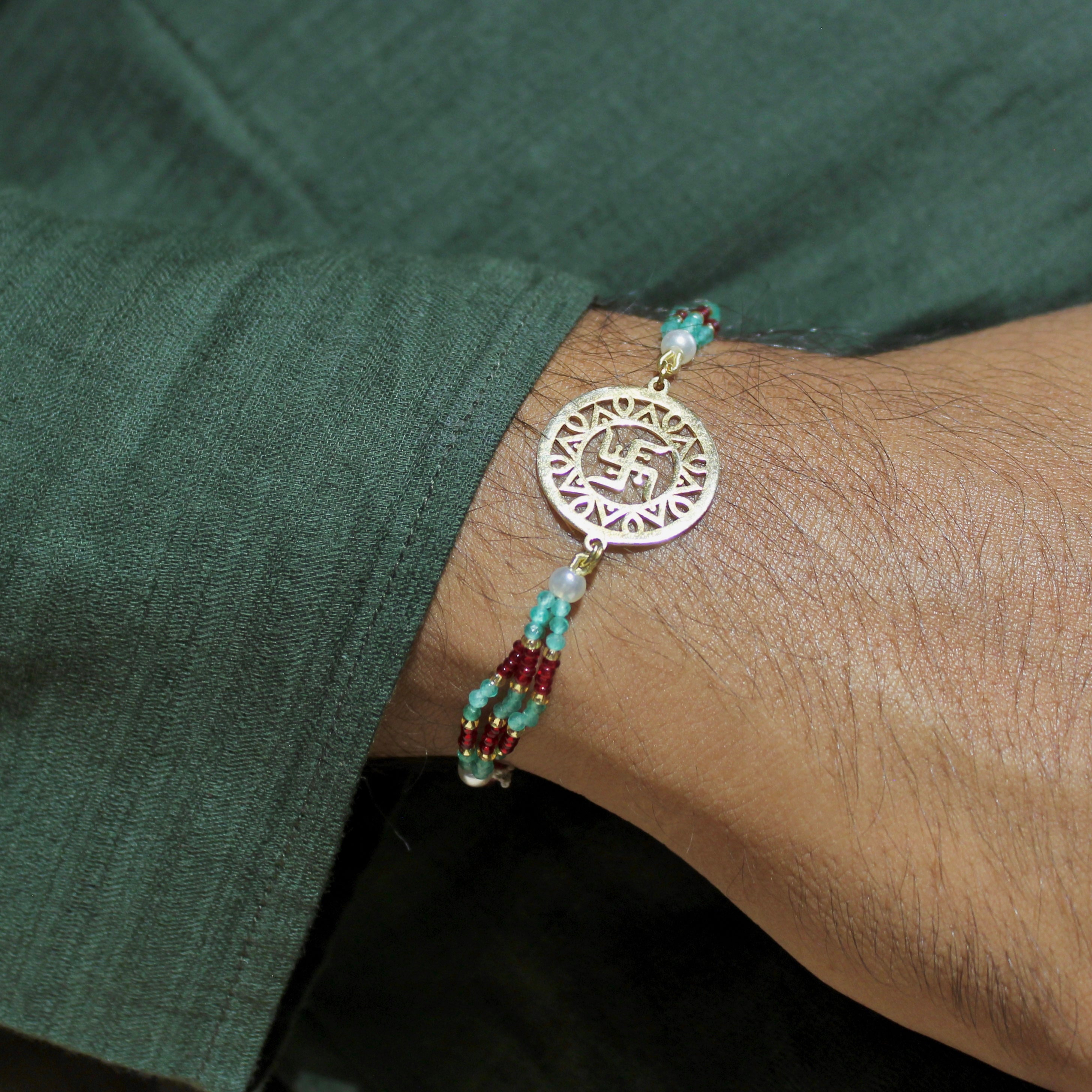 Satiya In Gold Polish Maroon Thread Rakhi In 925 Silver