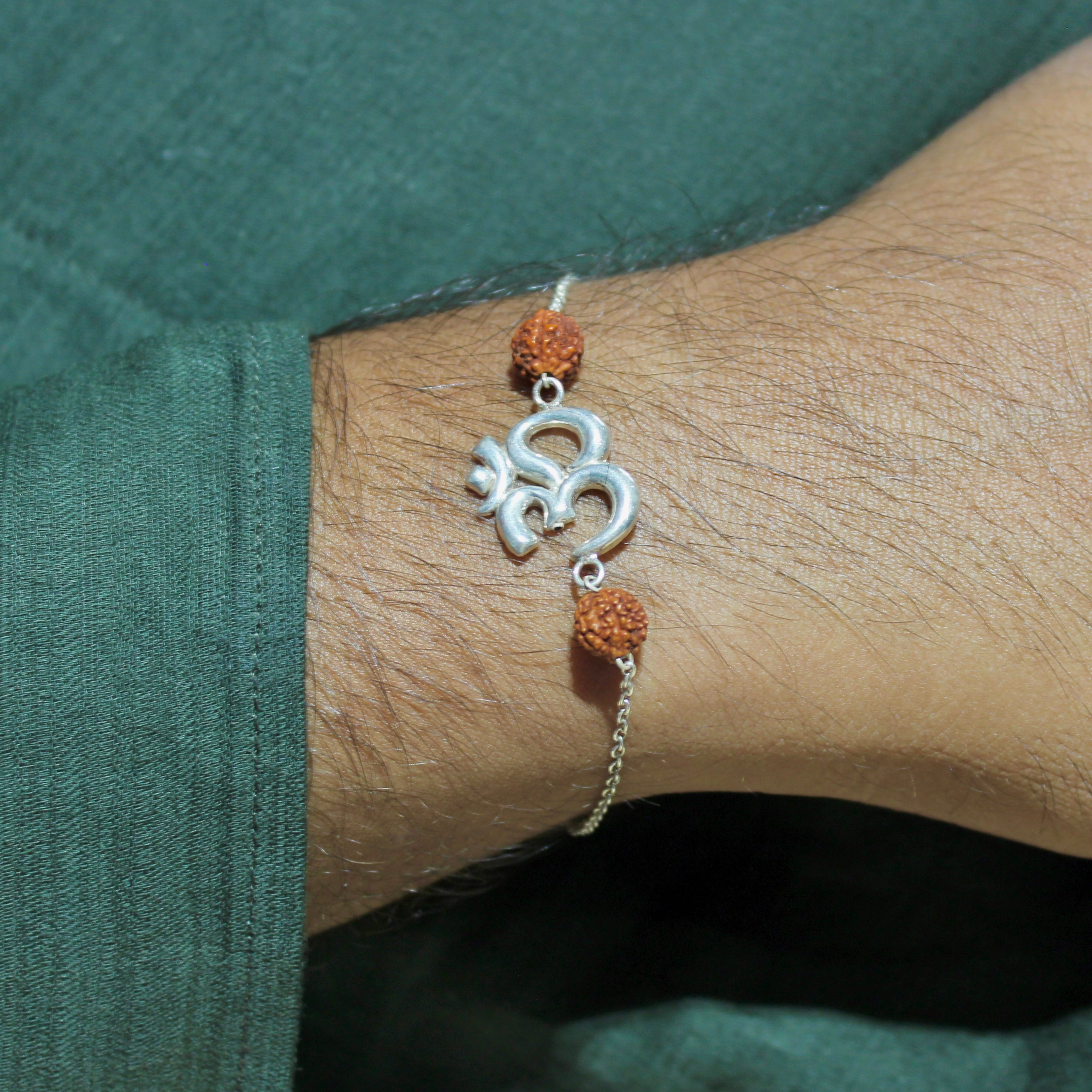 Big Om Rudraksha and Laxmi ji Rudraksha Chained Rakhi in 925 Silver