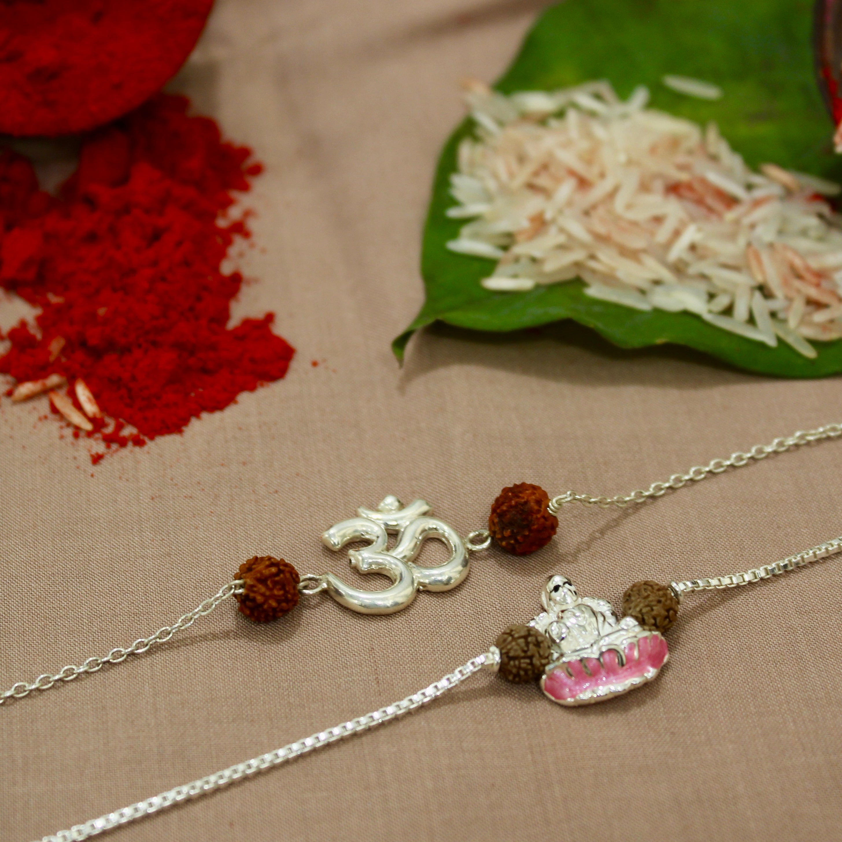 Big Om Rudraksha and Laxmi ji Rudraksha Chained Rakhi in 925 Silver