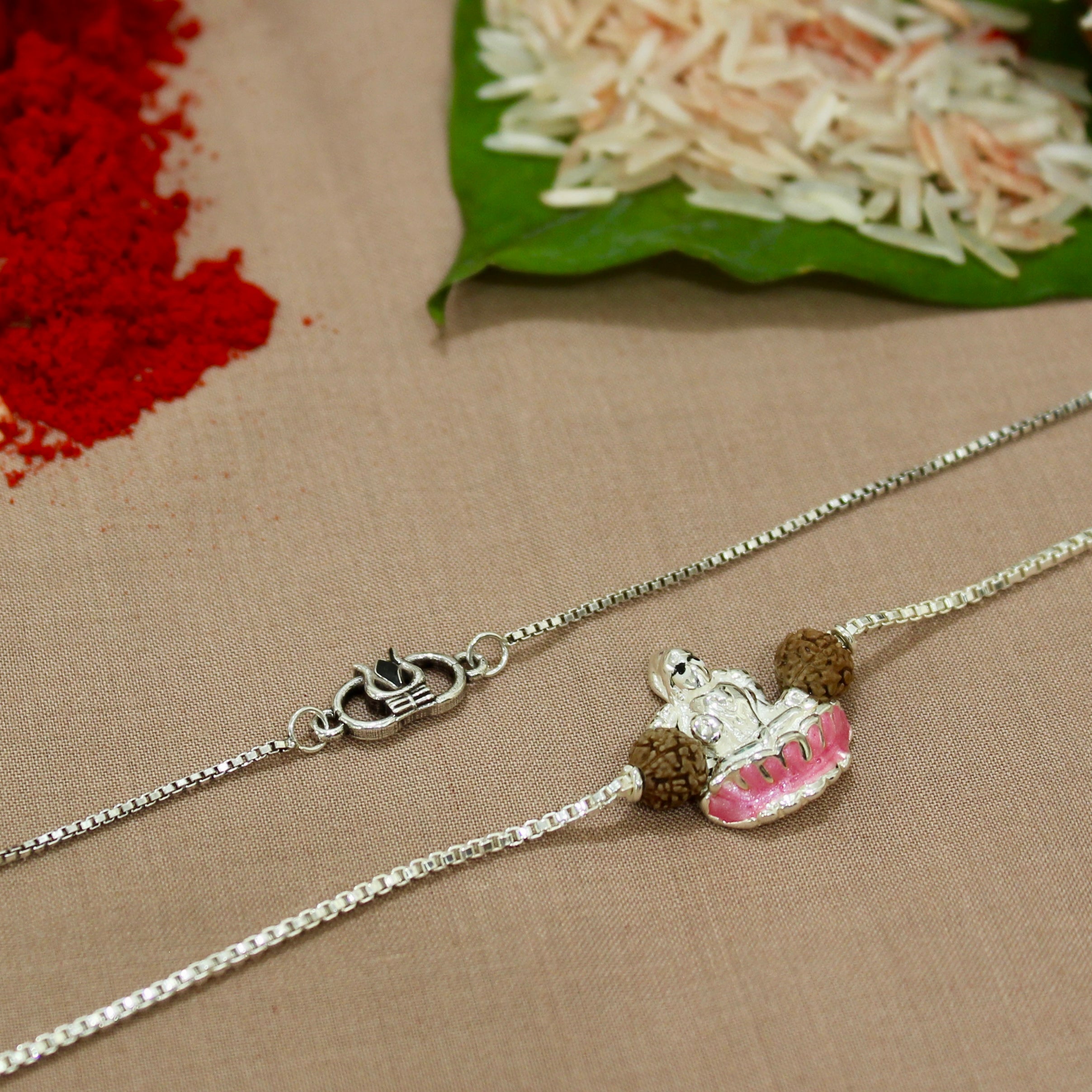 Trishul Mini Charm and Laxmi ji Rudraksha Chained Rakhi in 925 Silver