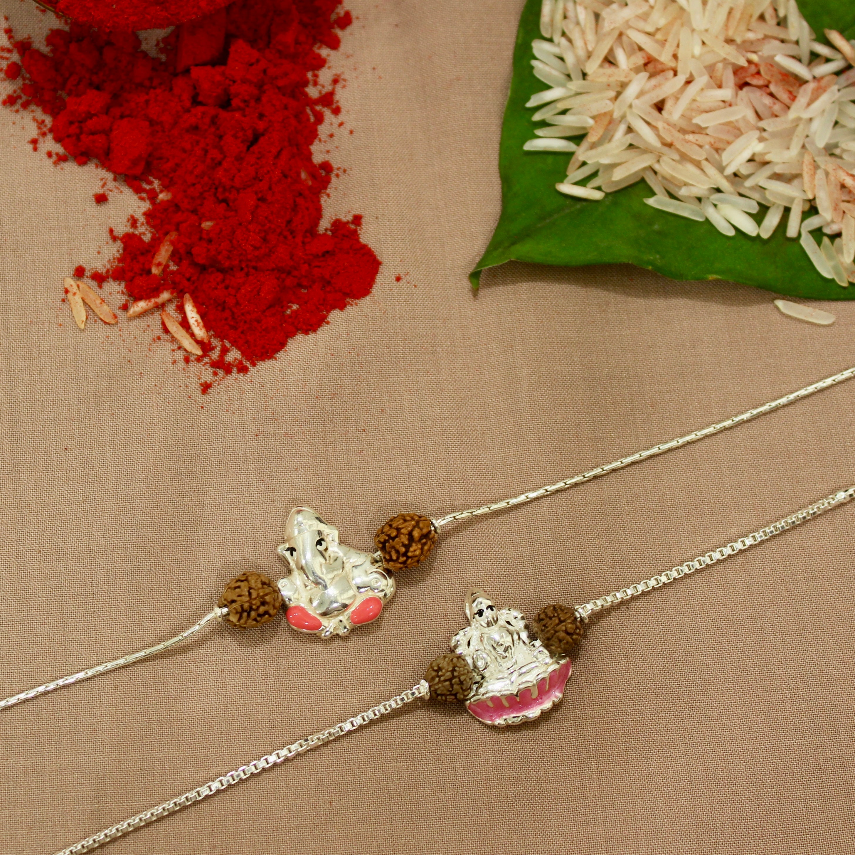 Lord Ganesh and Laxmi ji Rudraksha Chained Rakhi in 925 Silver