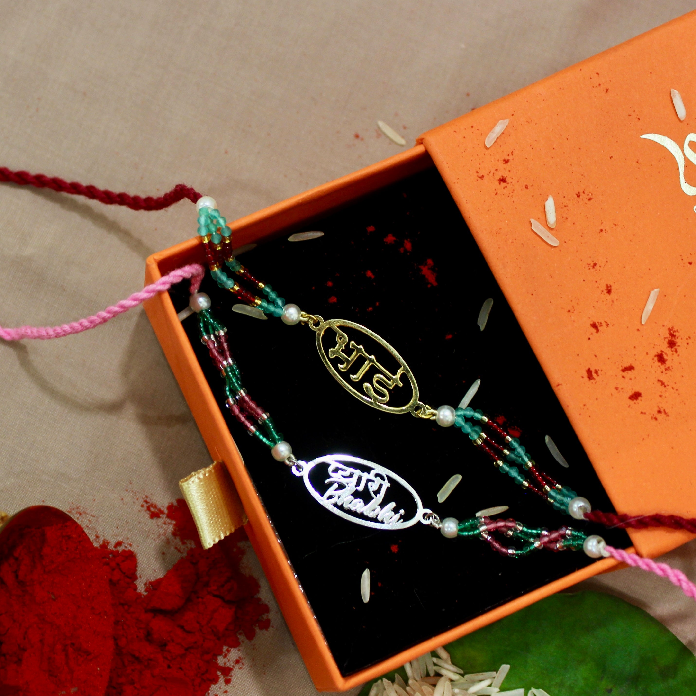 Bhai in Circle Gold Polish Maroon Thread and Pyari Bhabhi Pink Thread Rakhi in 925 Silver