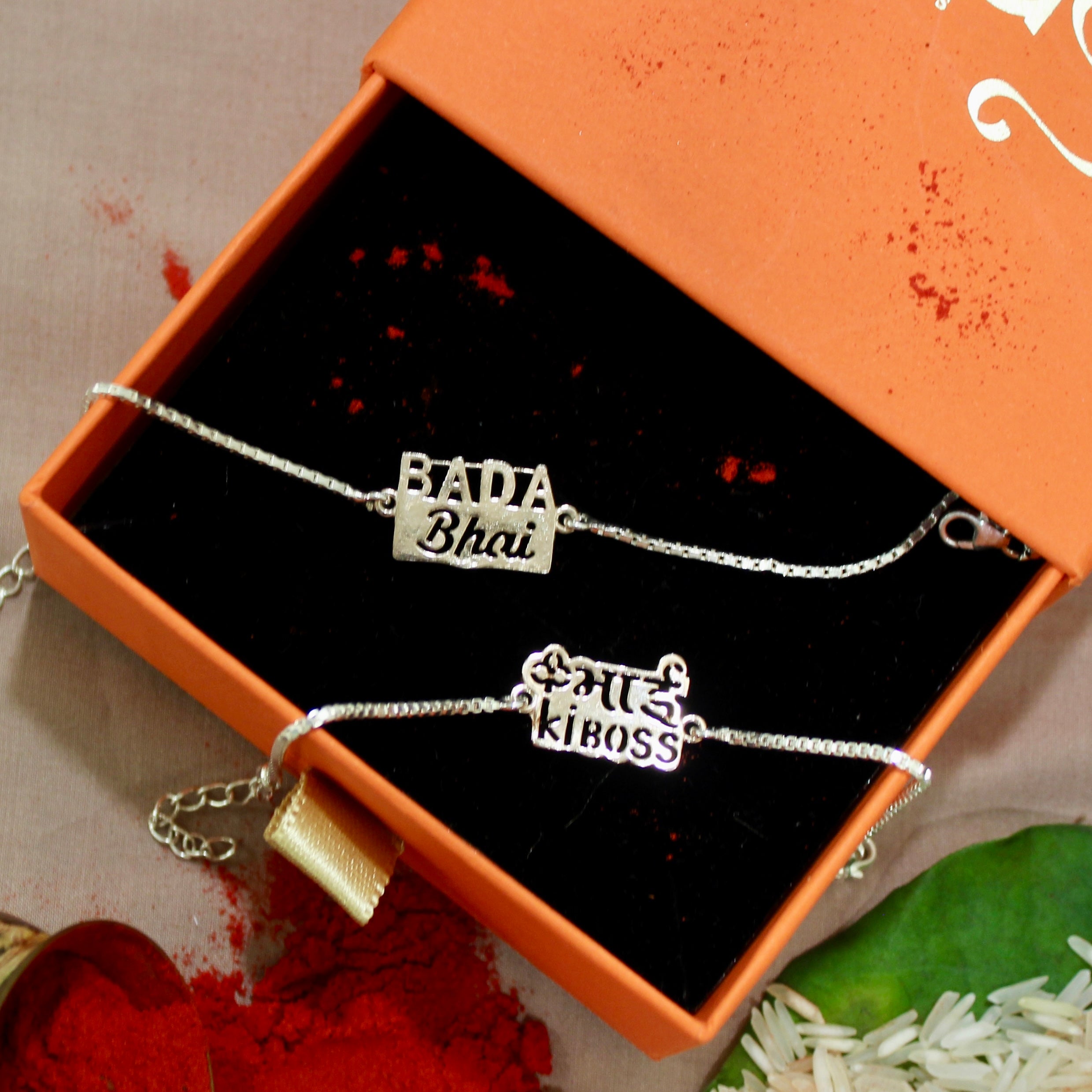 Bada Bhai' Chained Rakhi in Rose Gold Polish and Pyari Bhabhi Pink Thread Rakhi