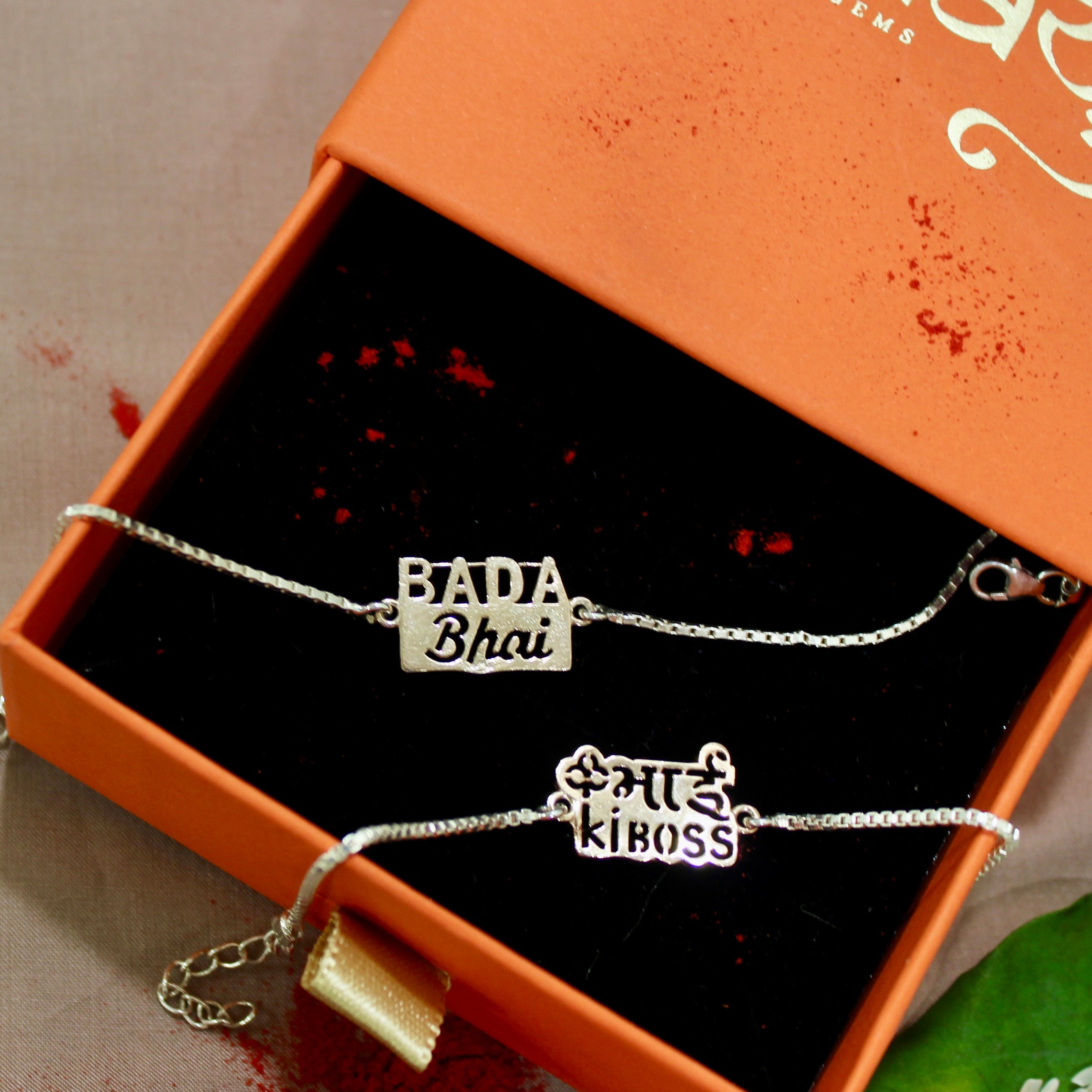 Bada Bhai' Chained Rakhi in Rose Gold Polish and Pyari Bhabhi Pink Thread Rakhi
